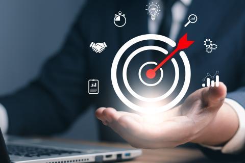 Cible avec icones symbolisant la réussite d'un projet